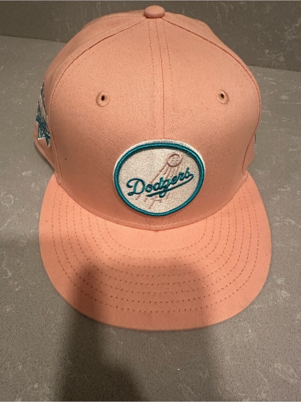 New Era DodgersCap in Light Pink with Teal Patch